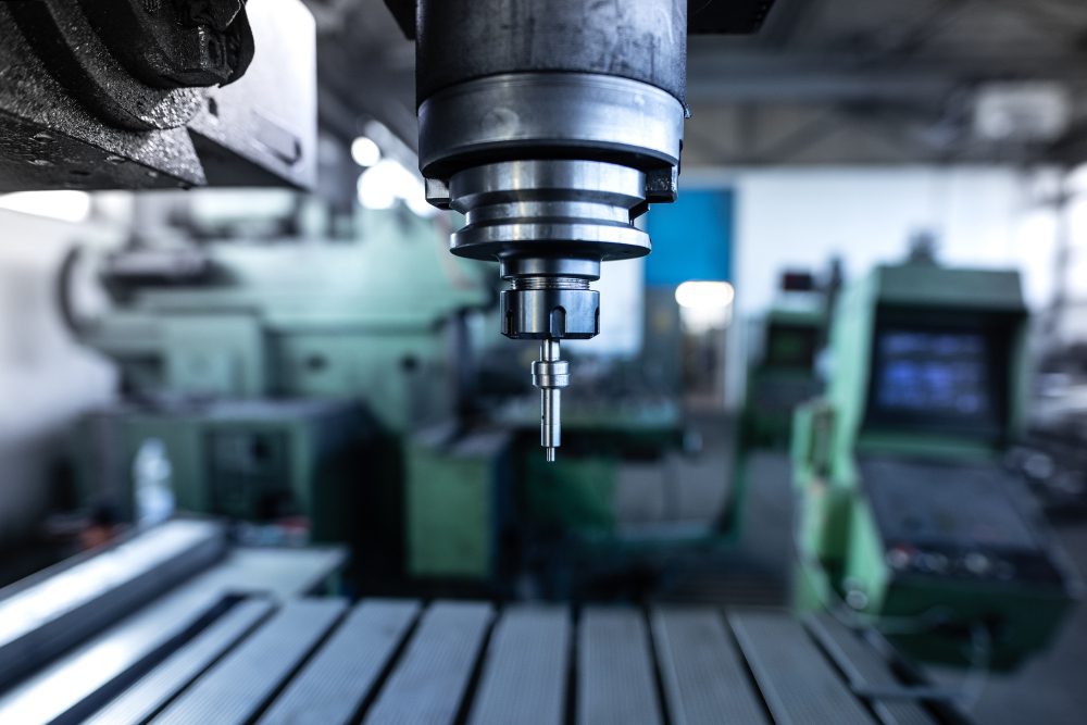 Industrial metal drill machine in metalworking workshop<br />